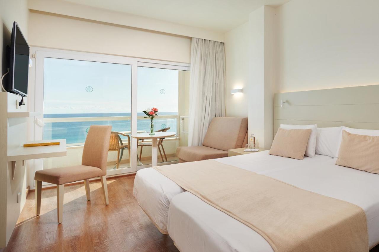 Dreibettzimmer mit Meerblick