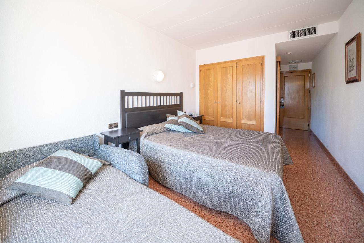 Triple Room (2 Adults + 1 Child)