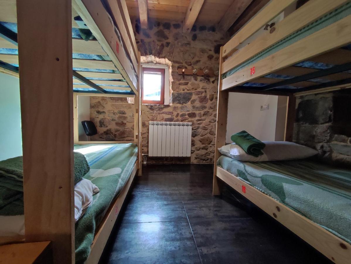 Cama en habitación compartida de 8 camas