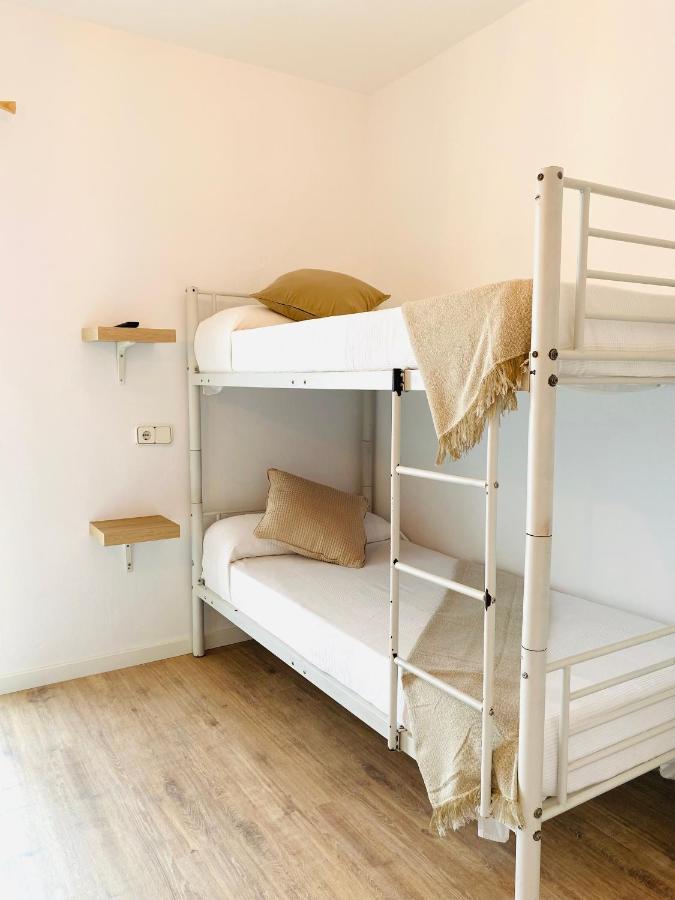Habitación Doble Estándar con litera y baño compartido