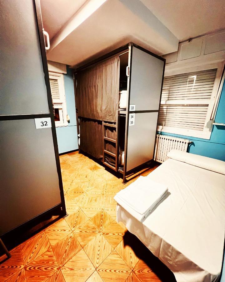 Cama em Beliche num Dormitório Misto