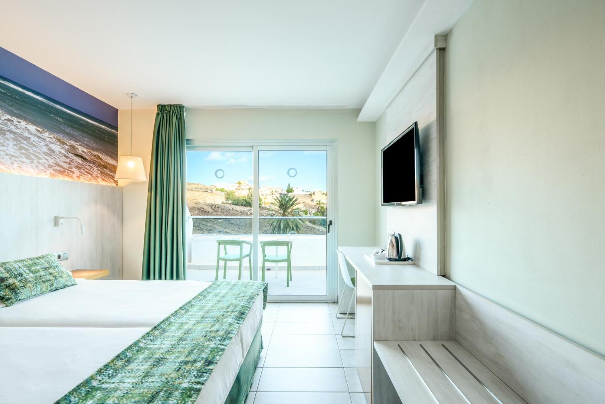 Habitación Doble Deluxe con balcón y vistas al mar