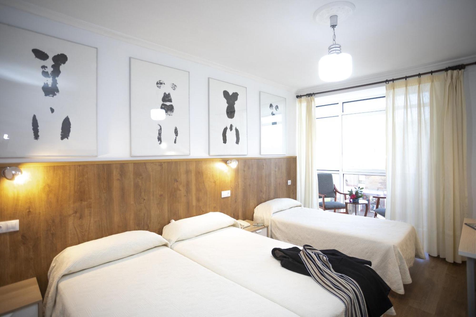 Habitación Doble con cama supletoria (3 adultos)