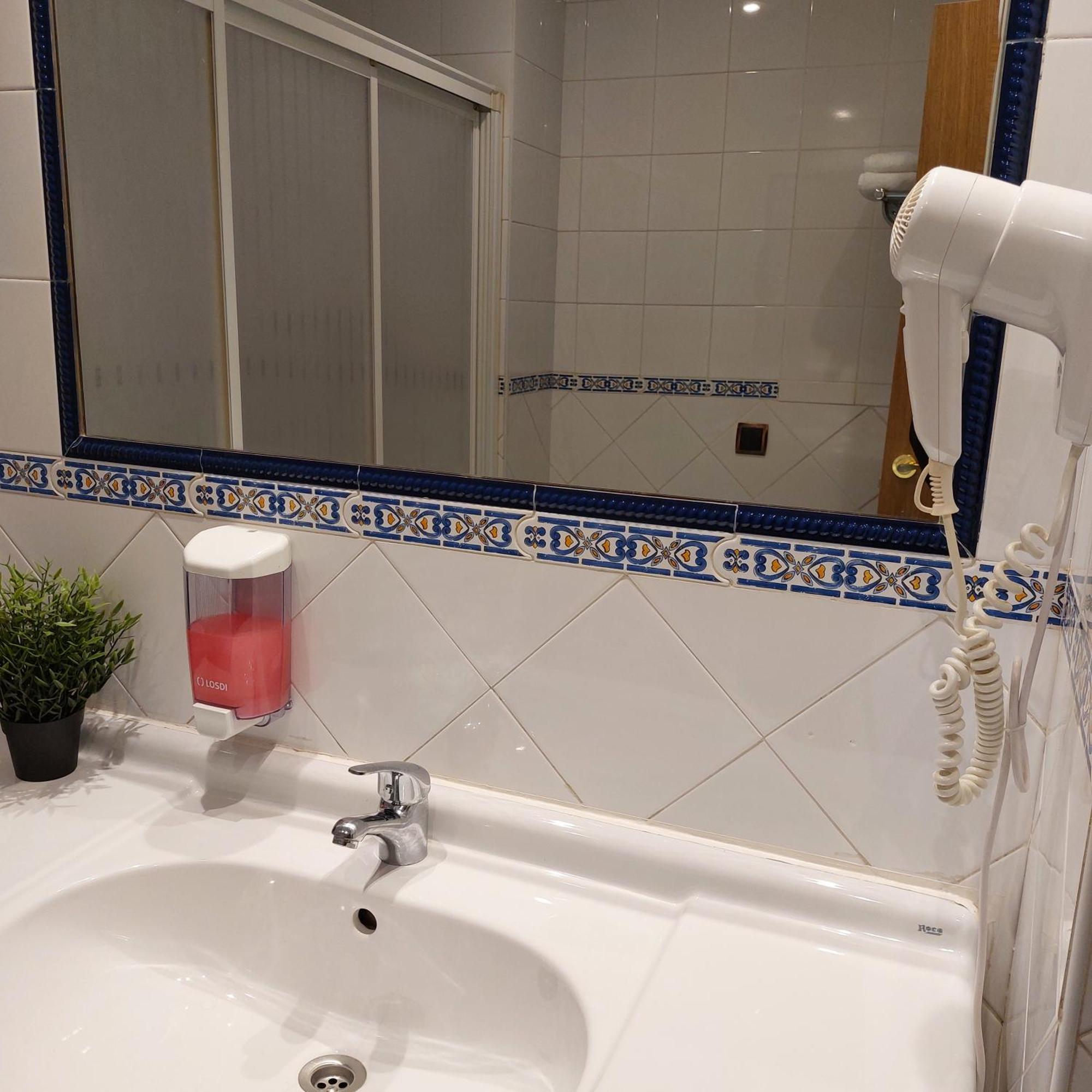 Habitación Triple Confort con ducha