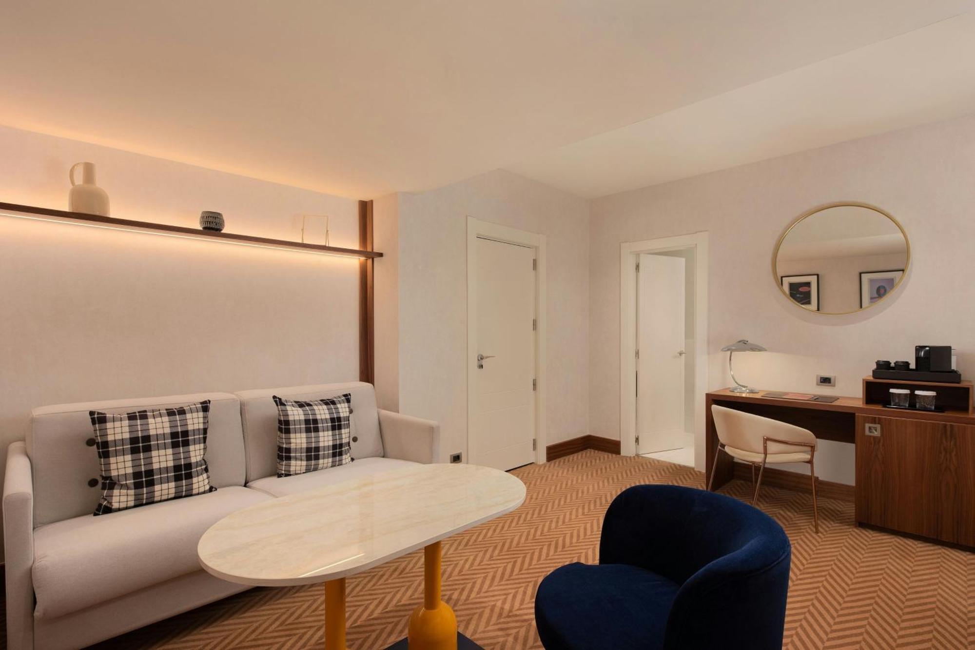 Kamer met een Kingsize Bed en Slaapbank