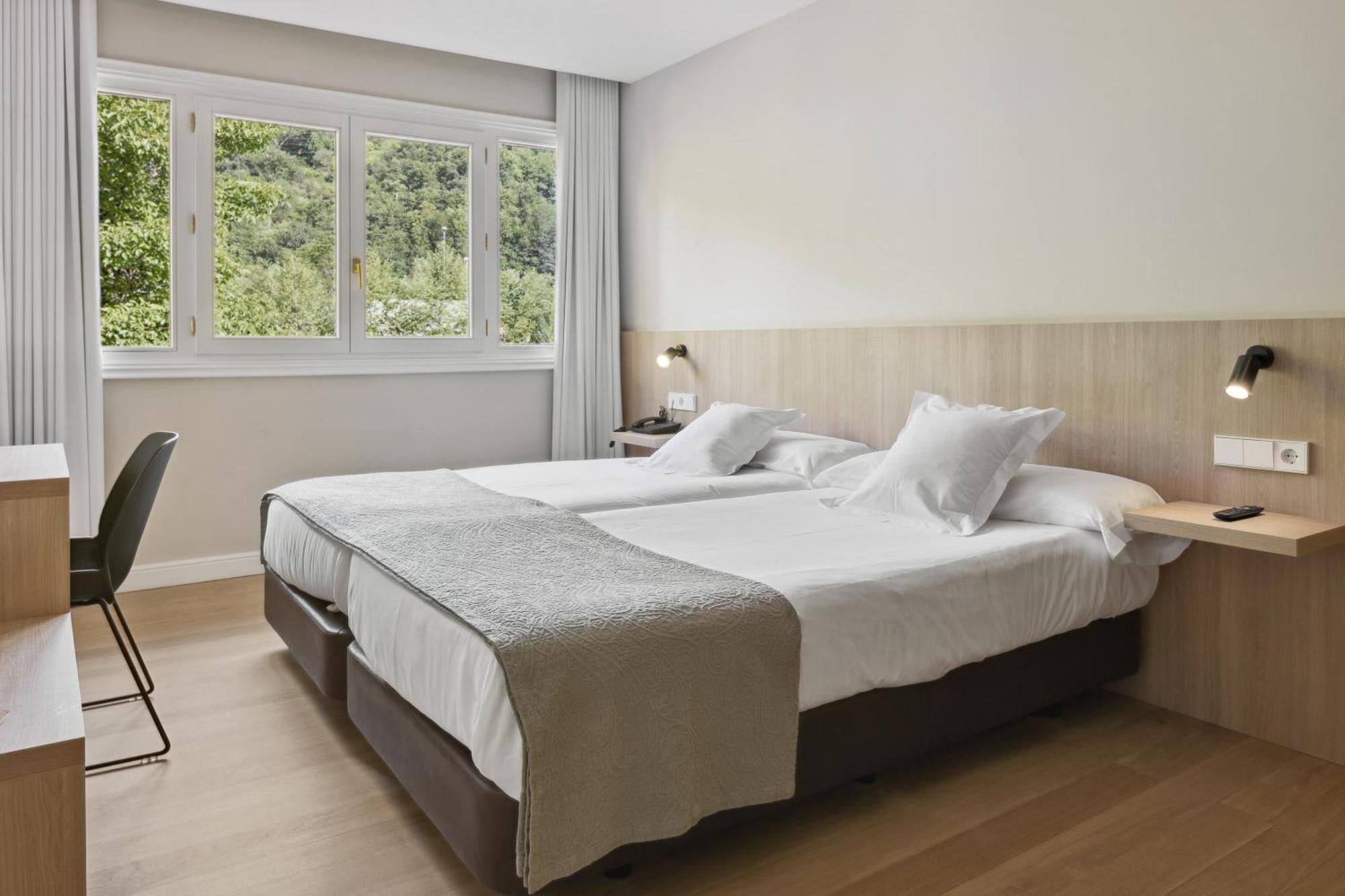 Habitación Doble con cama supletoria - 2 camas