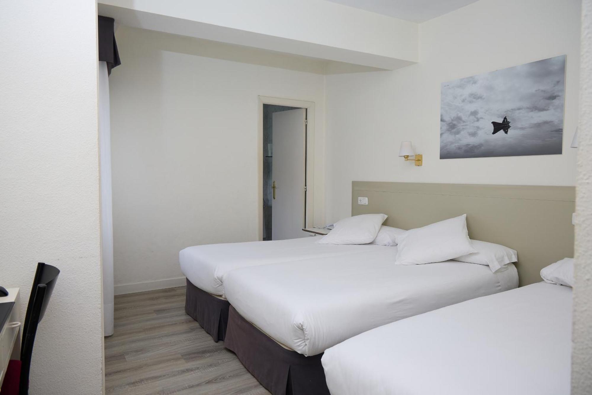 Quarto Twin com Cama Extra