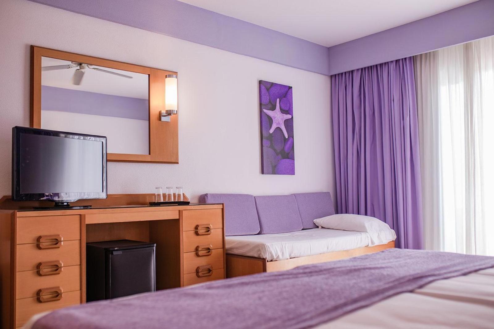 Dreibettzimmer mit Balkon