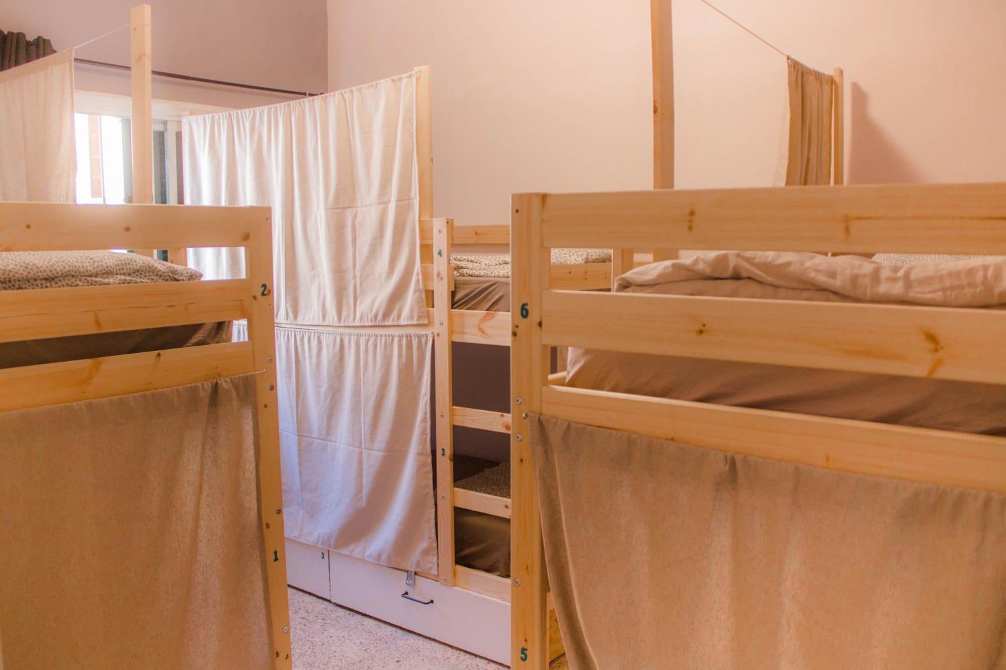Cama en habitación compartida mixta de 6 camas