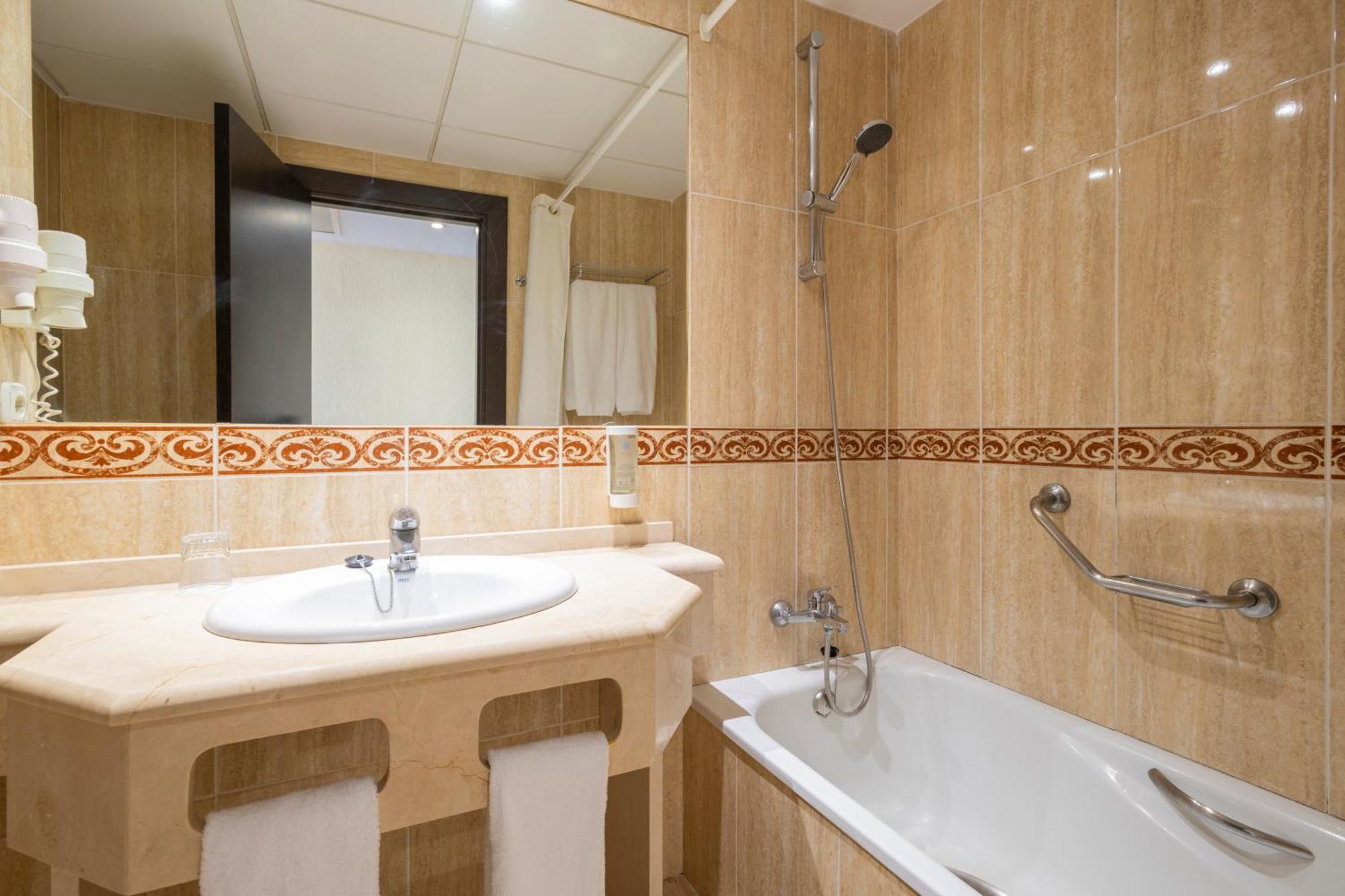 Superior Triple Room With Side Sea View