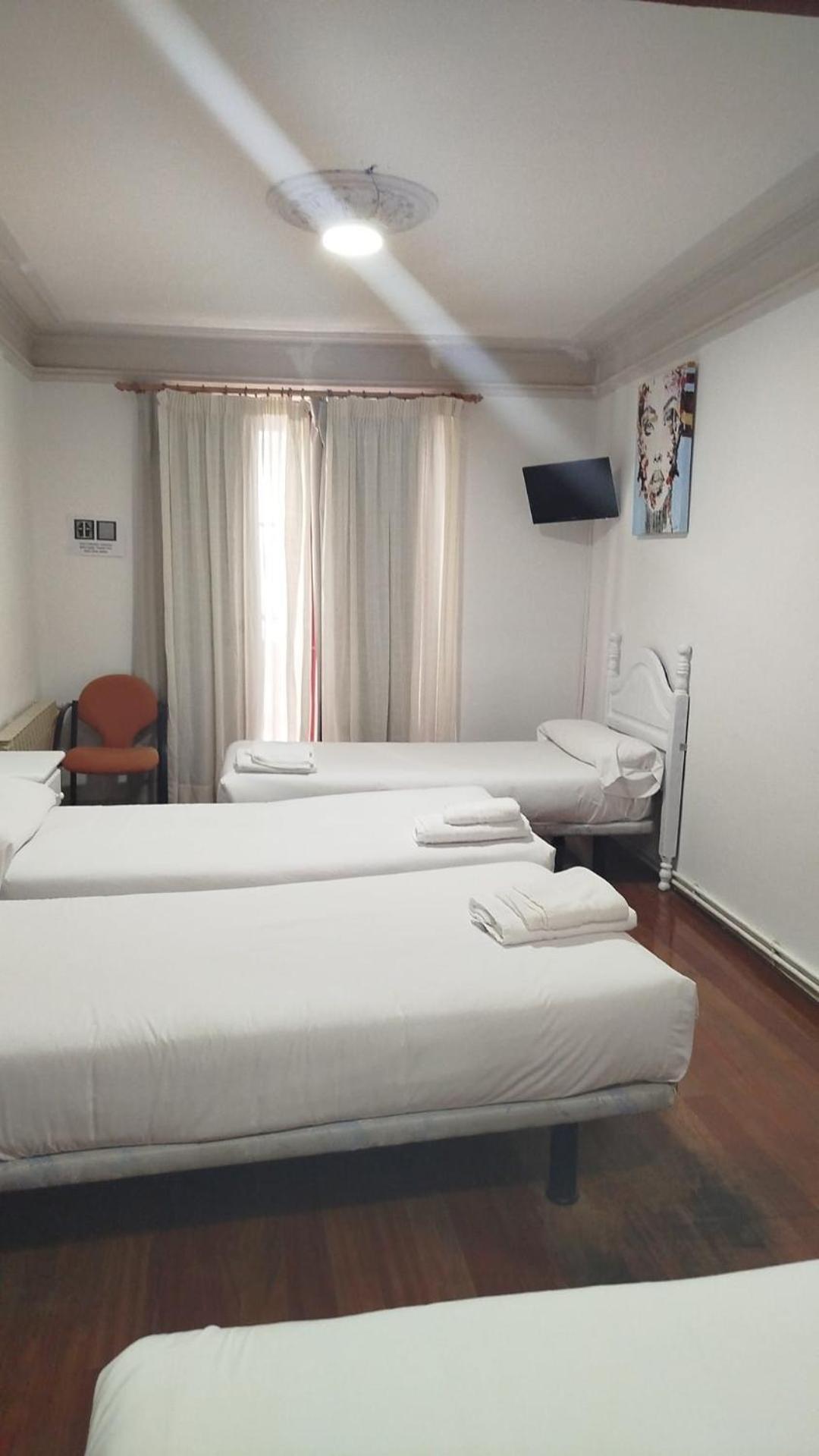 Triple Room with Shared Bathroom
