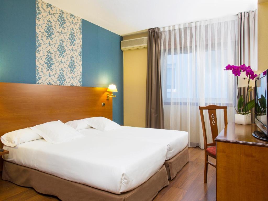 Habitación Doble (2 adultos + 1 niño) - 1 o 2 camas