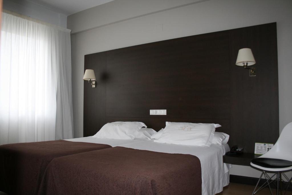 Habitación Doble (2 adultos + 1 niño) - 1 o 2 camas