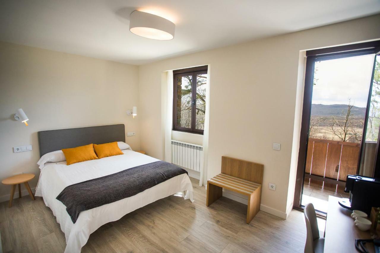 Habitación superior con balcón