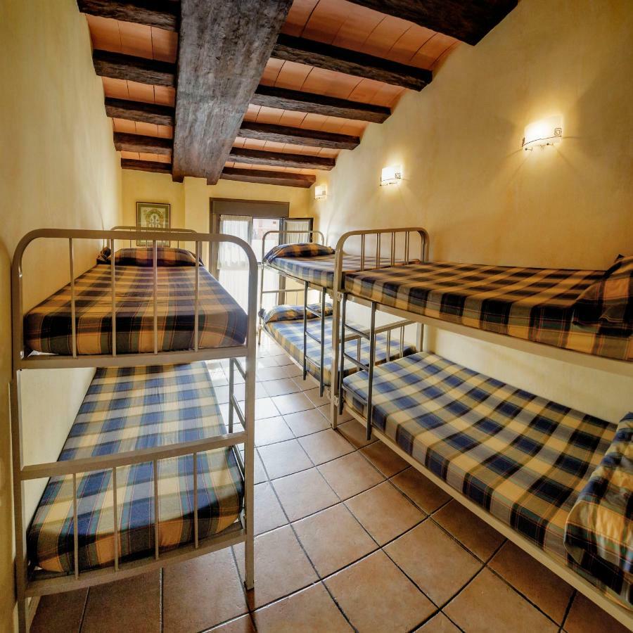 Cama Individual en dormitorio compartido de 6 camas