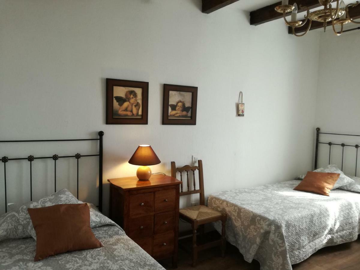Cama individual en habitación compartida