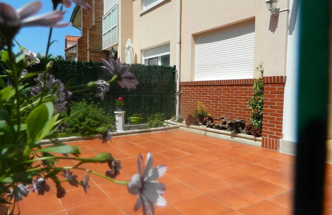 Apartamento con jardín privado cerca playa Usil - Mogro-1