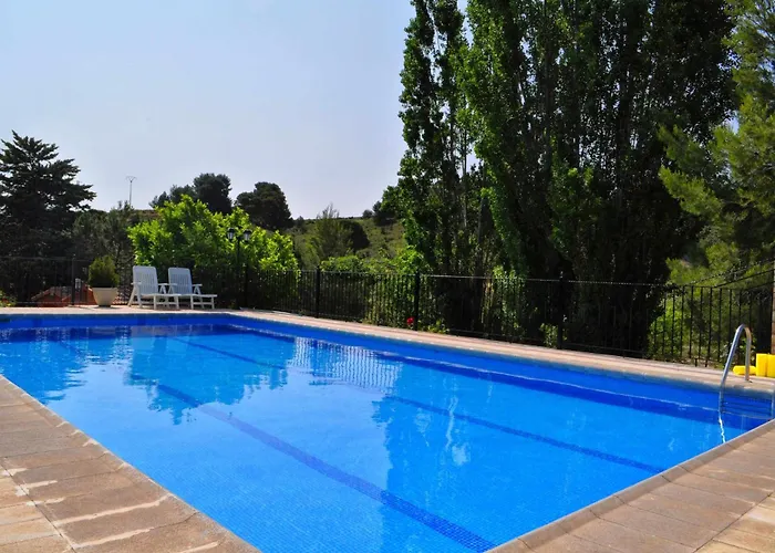 Casa rural El Salero Piscina campo de fútbol y voley chimenea barbacoa