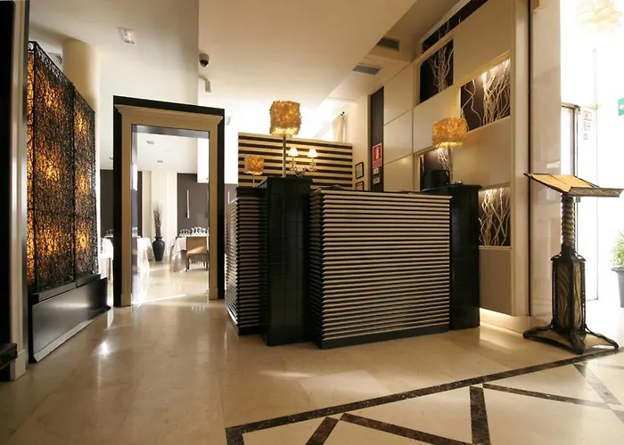 Hotel Asador H.M. Versus